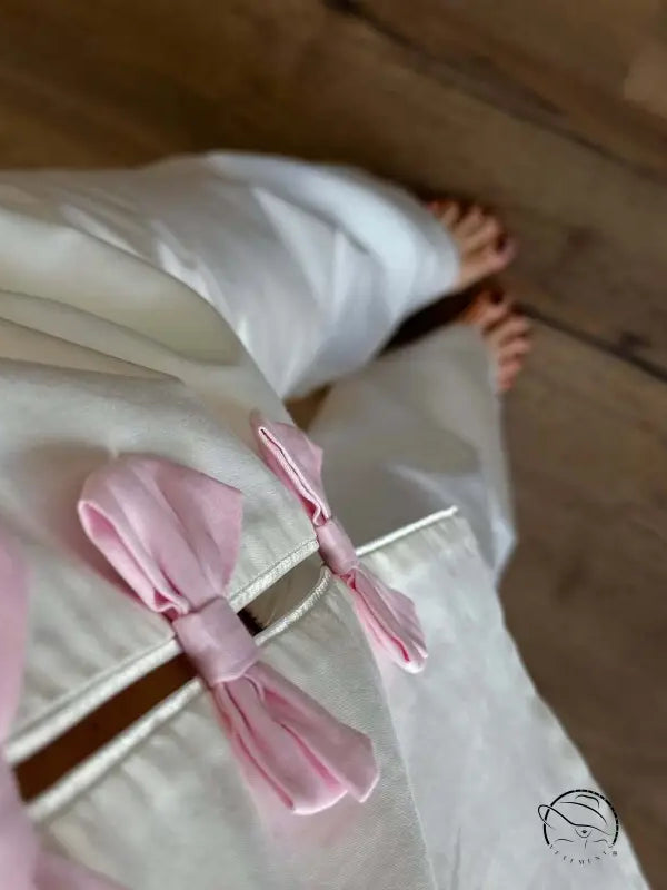 Elegant white and pink satin ribbon bow on langry fashion pajamas set