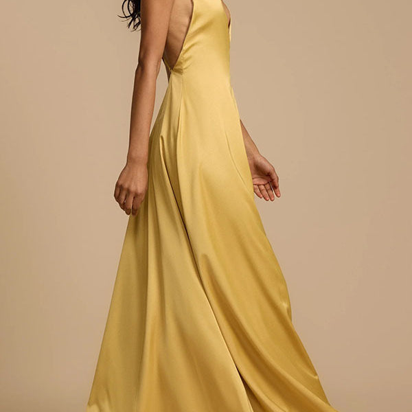 Mustard yellow satin maxi dress showcasing elegant fashion and luxurious langry style