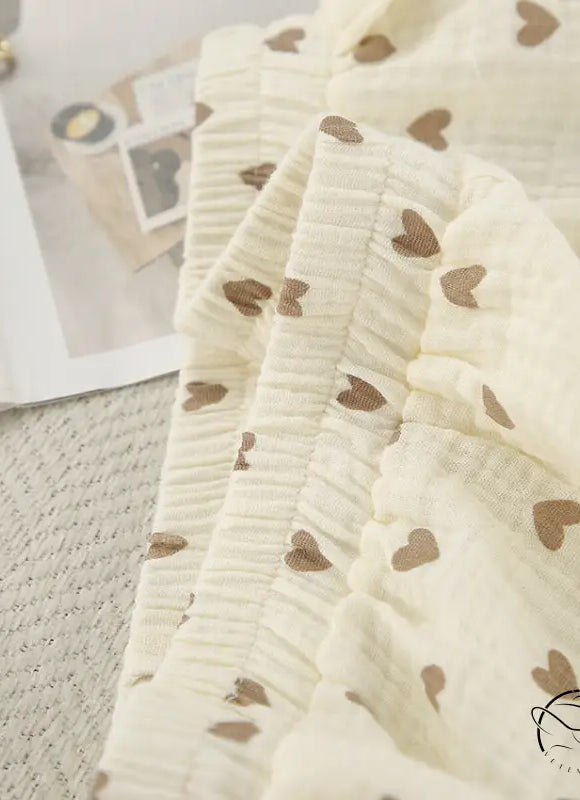 Cream-colored cotton linen homewear with heart patterns and slit shorts