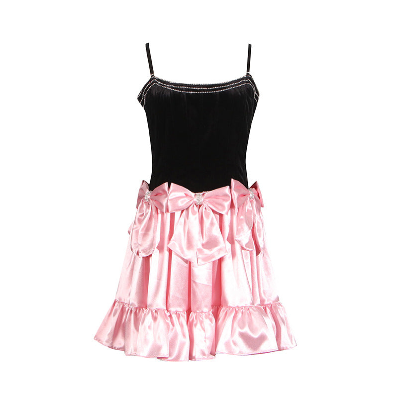 Black and pink party dress with spaghetti straps and ruffled skirt, perfect for Langry fashion
