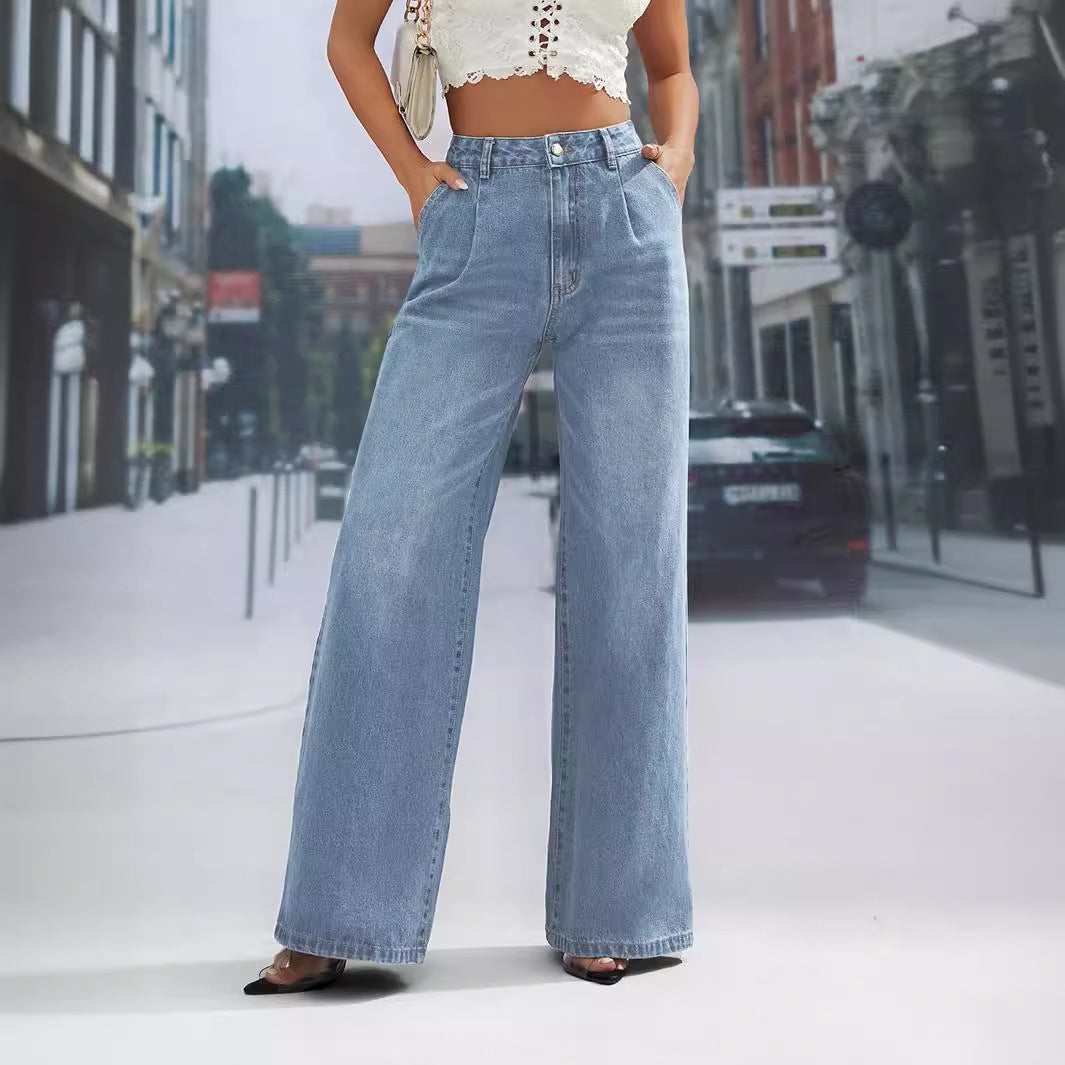 Light wash wide leg denim trousers with pleats, stylish and flattering for a fashionable look