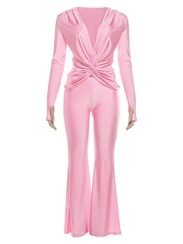 Pink satin long sleeve jumpsuit with front twist and high waist design
