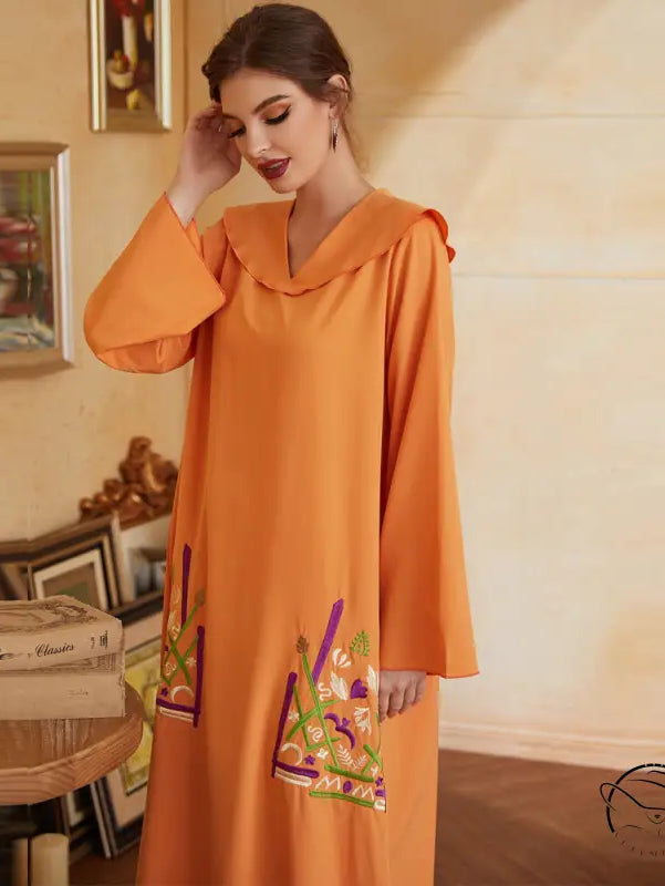Beautiful langry fashion embroidered dress with bell sleeves and high neckline