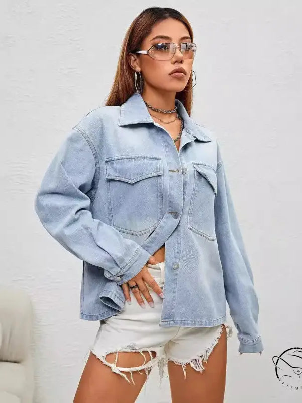 Light wash denim coat by Langry with button-up shirt style and chest pockets