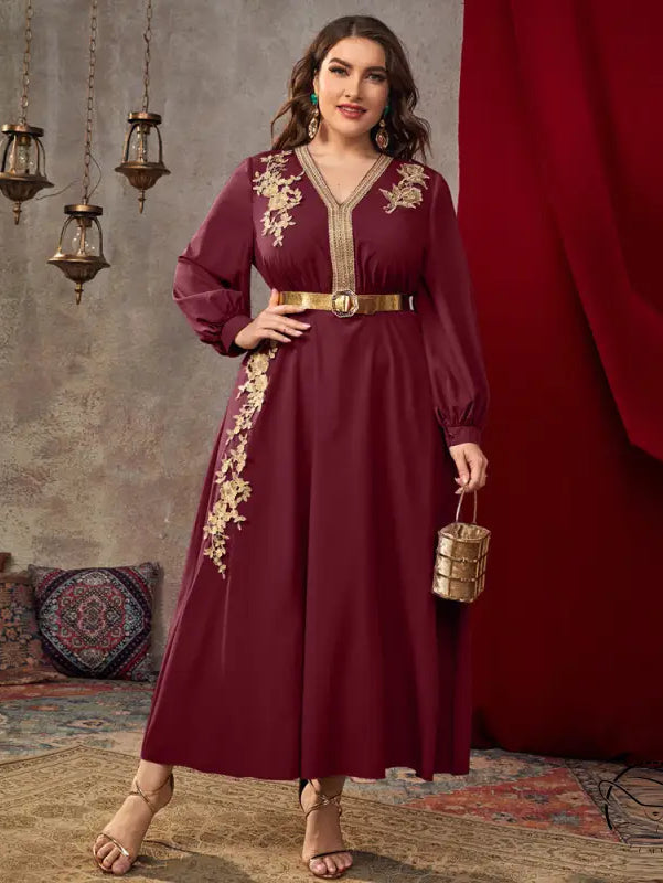 Burgundy long-sleeved A-line dress with gold embroidery and cinched waist