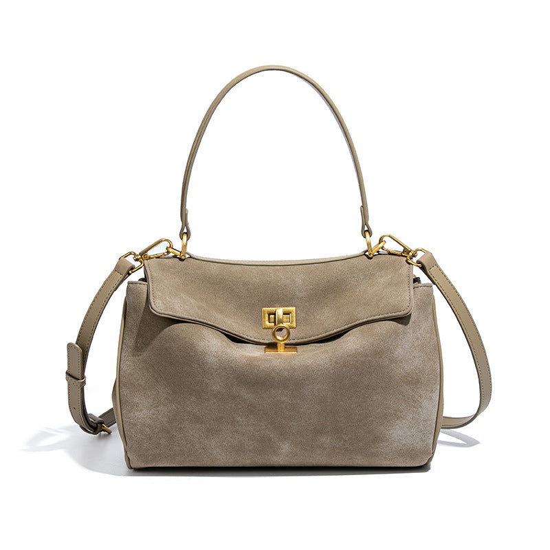 Gray suede handbag with gold hardware from the Original Frosted Deerskin Bag collection