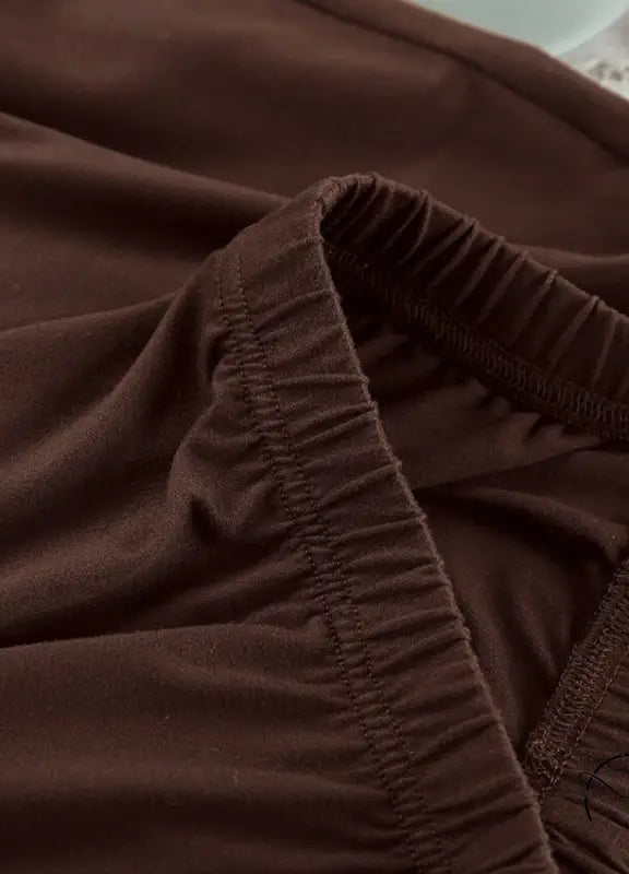 Close-up of brown elasticated waistband in comfortable knitted pajamas