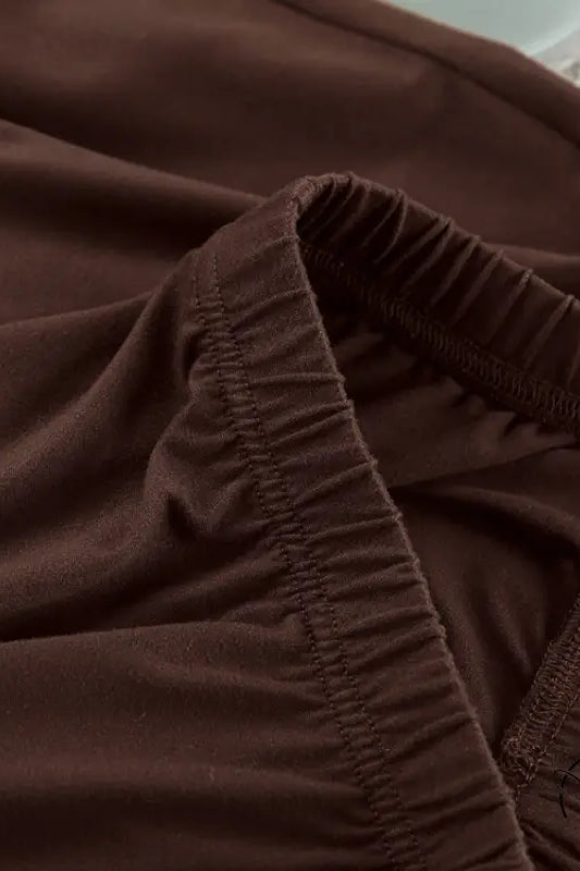 Close-up of brown elasticated waistband in comfortable knitted pajamas