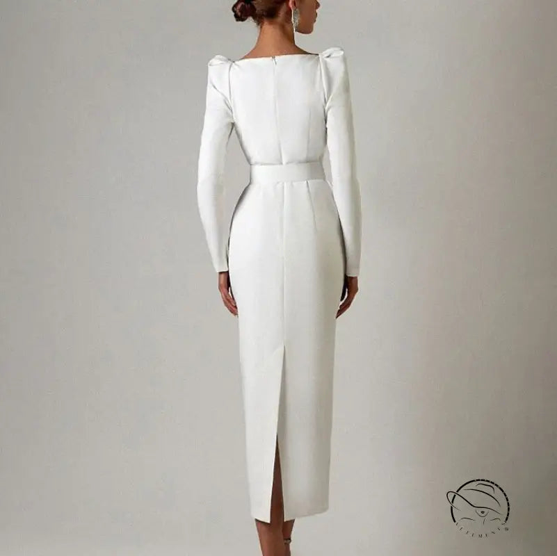 Elegant white long-sleeved langry fashion dress with belt and back slit