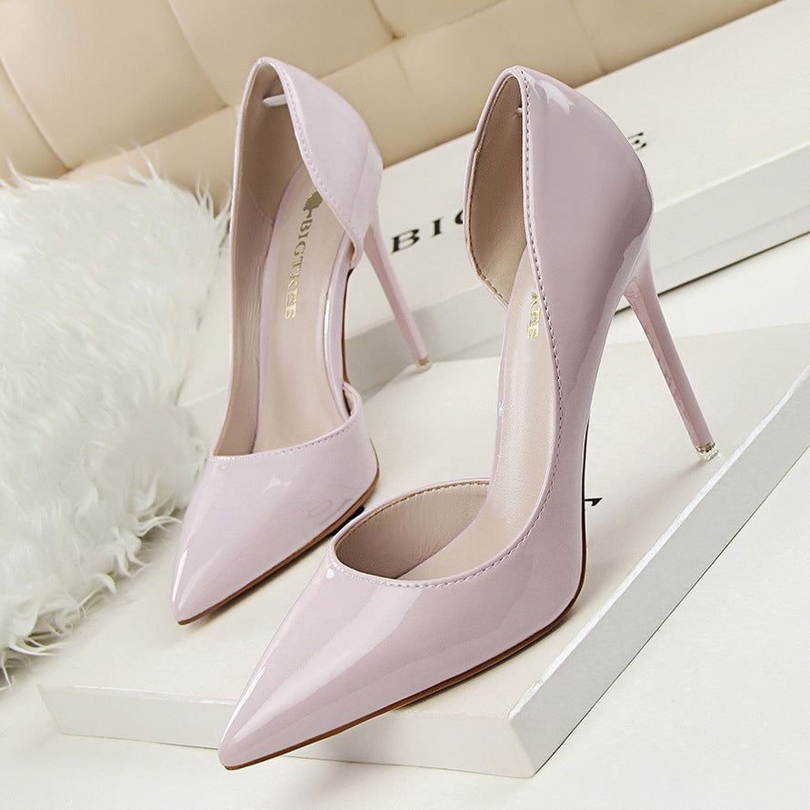 Pale pink patent leather stiletto heels showcasing elegant fashion for stylish ملابس