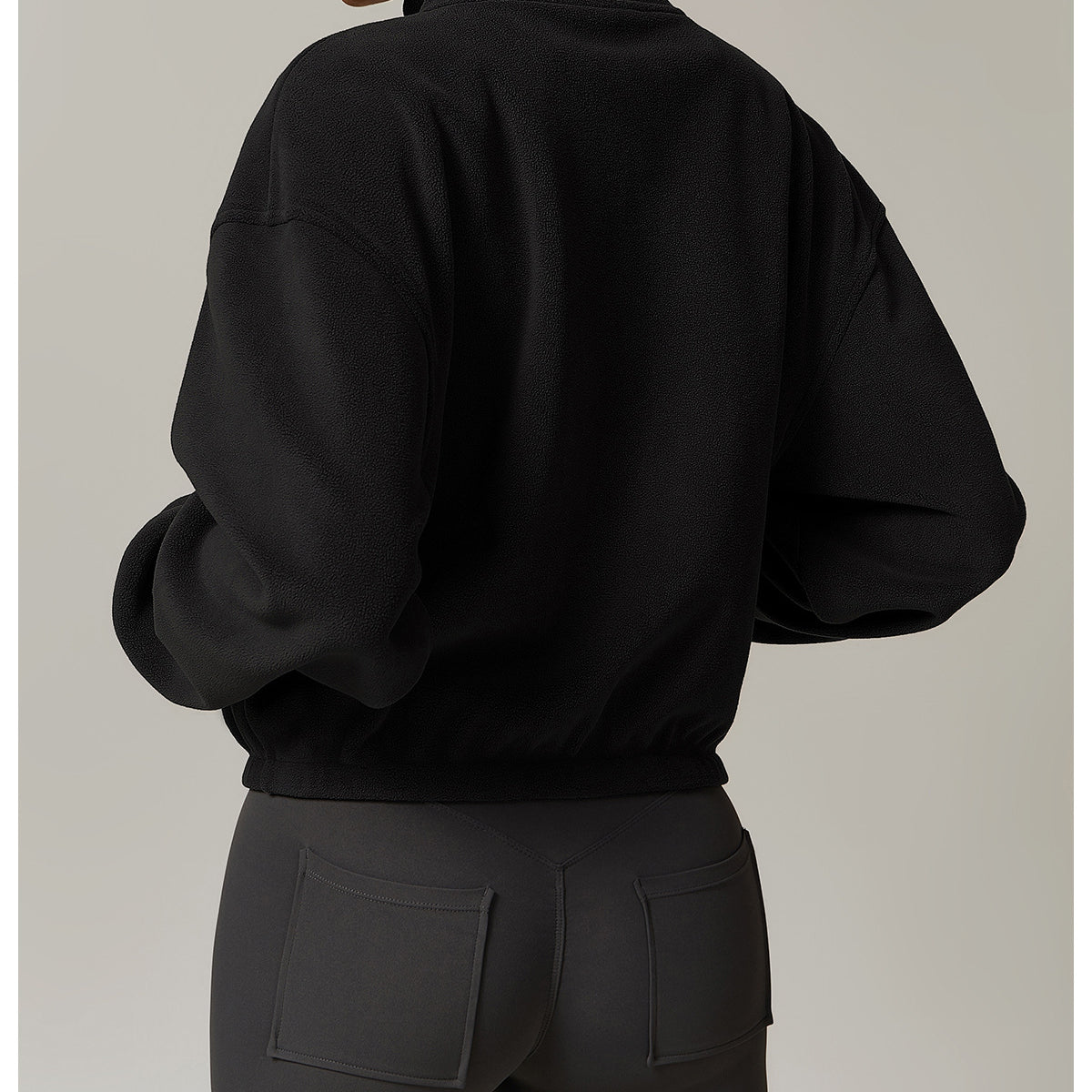 Black cropped zip-up sweatshirt with high collar, a stylish choice in ملابس fashion