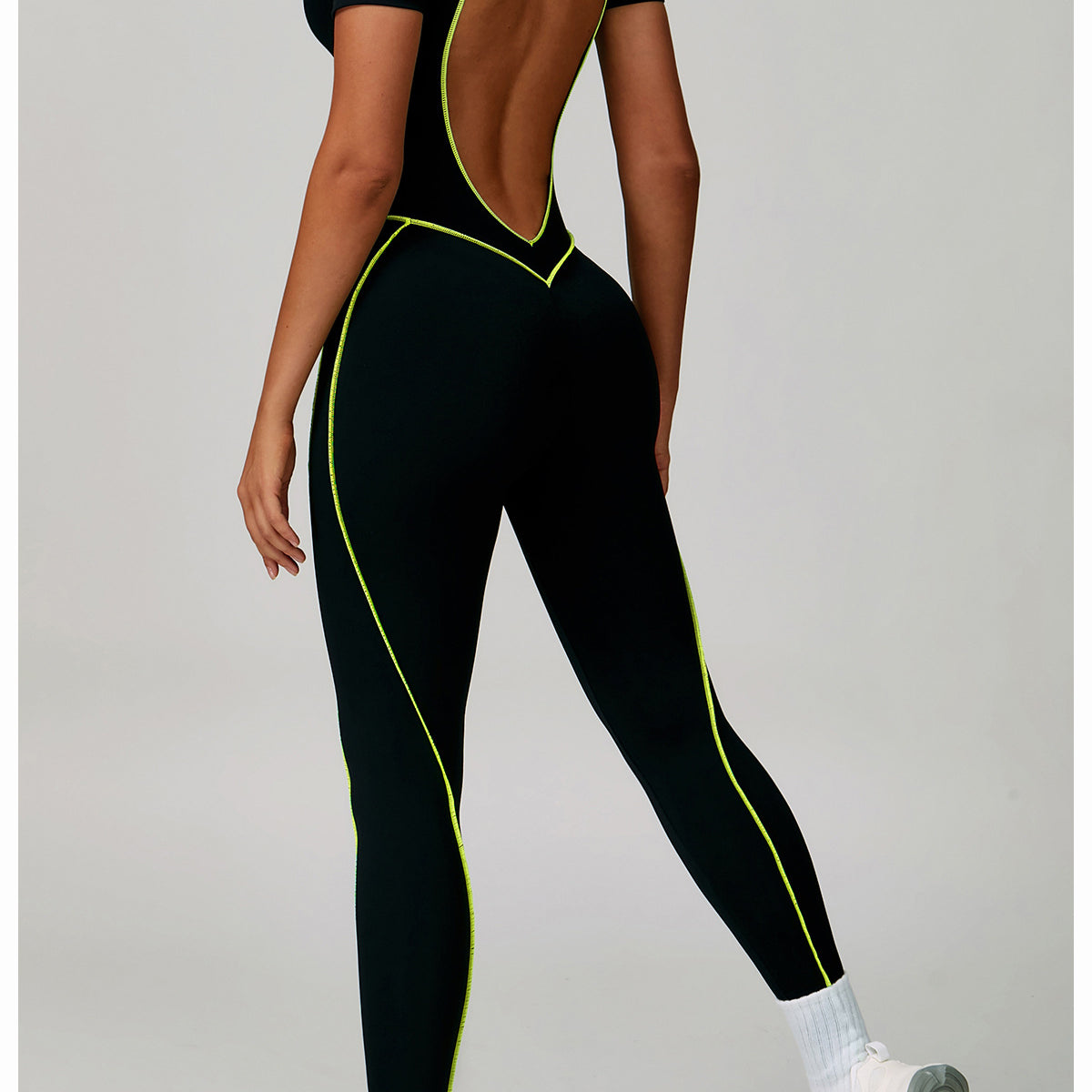 Black and yellow Langry fashion jumpsuit with open back for yoga
