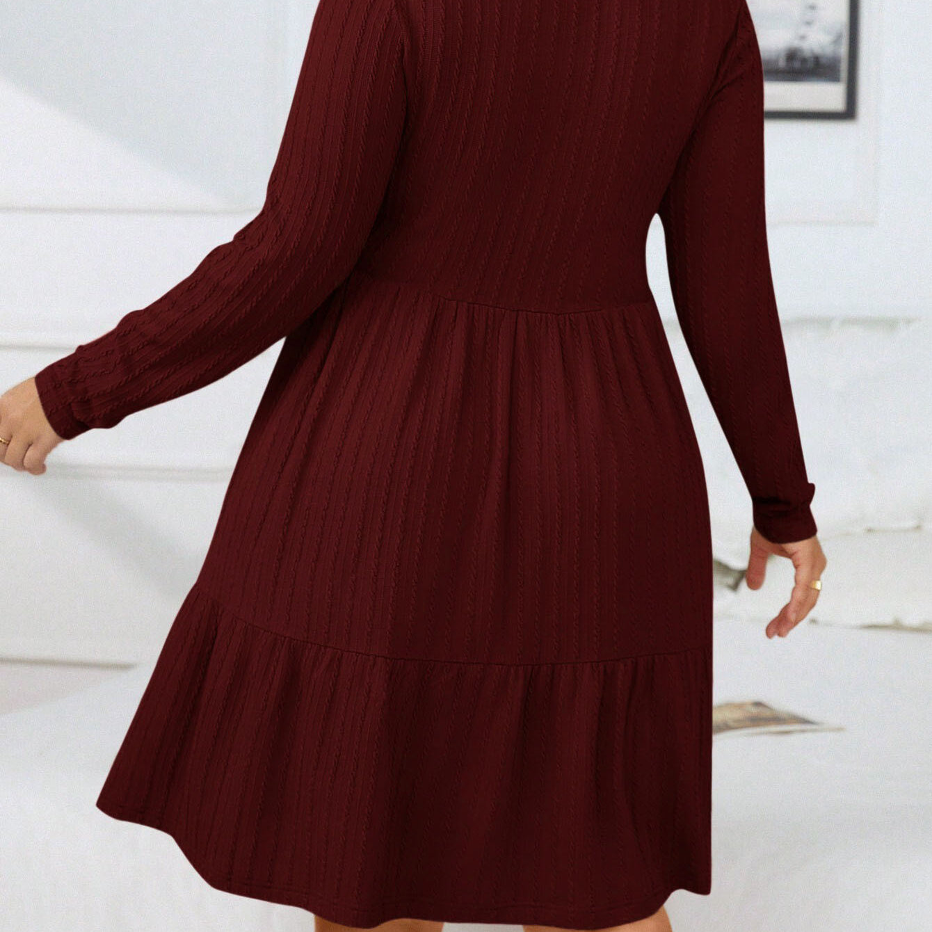 Elegant red midi dress with long sleeves and tiered design, perfect for formal occasions