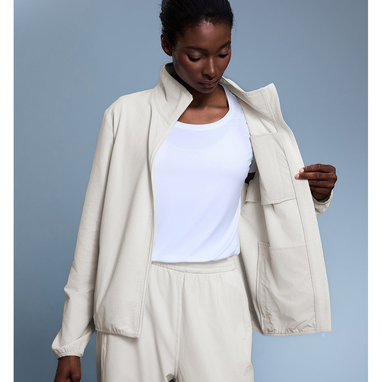 Langry cream-colored textured blazer with high collar, pockets, waterproof fashion coat