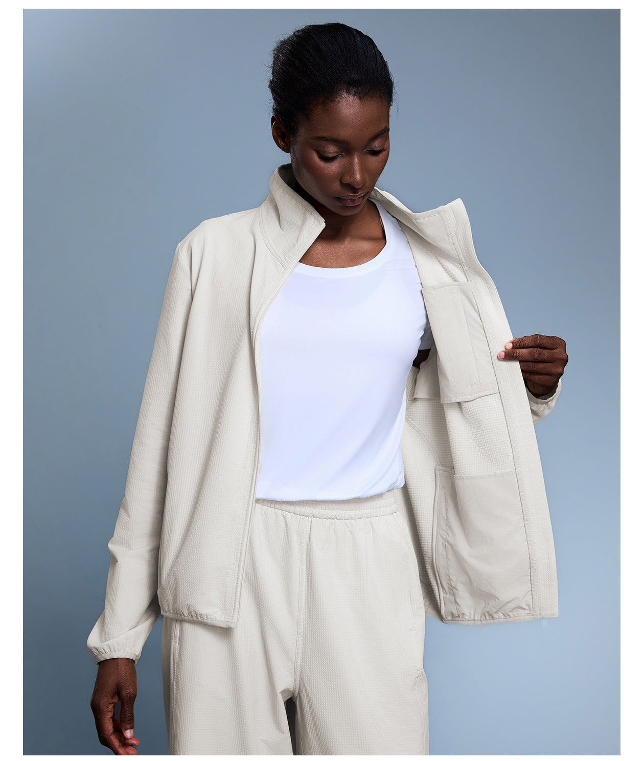 Langry cream-colored textured blazer with high collar, pockets, waterproof fashion coat