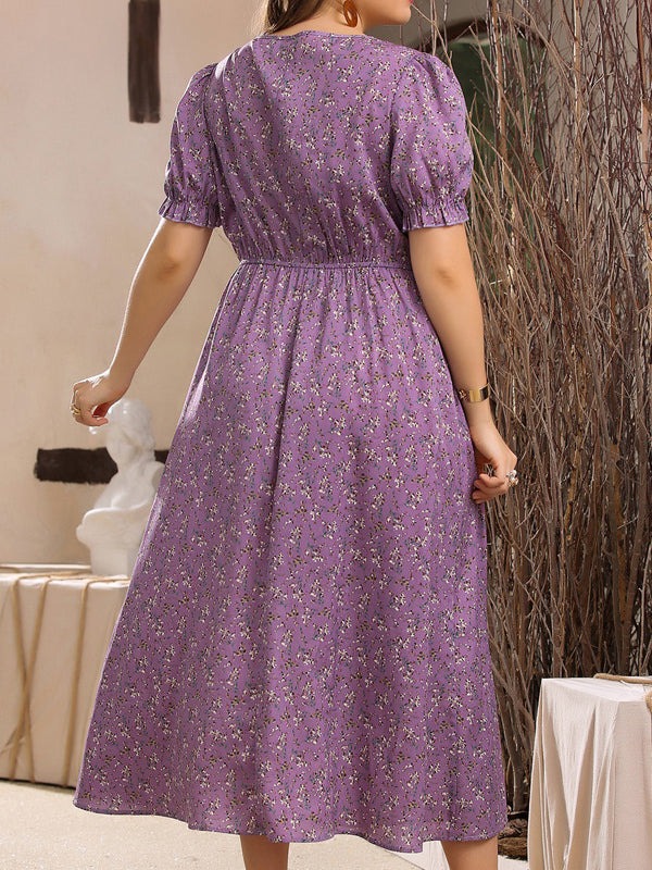 Purple floral midi dress with puff sleeves and empire waist, ideal for summer fashion