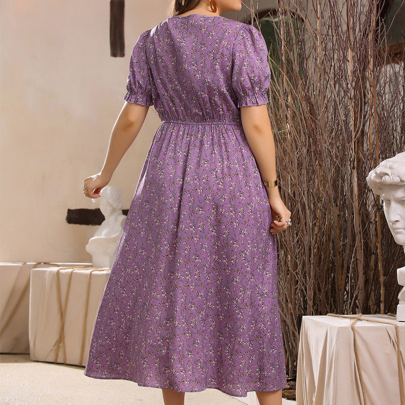 Purple floral midi dress with puff sleeves and empire waist, ideal for summer fashion