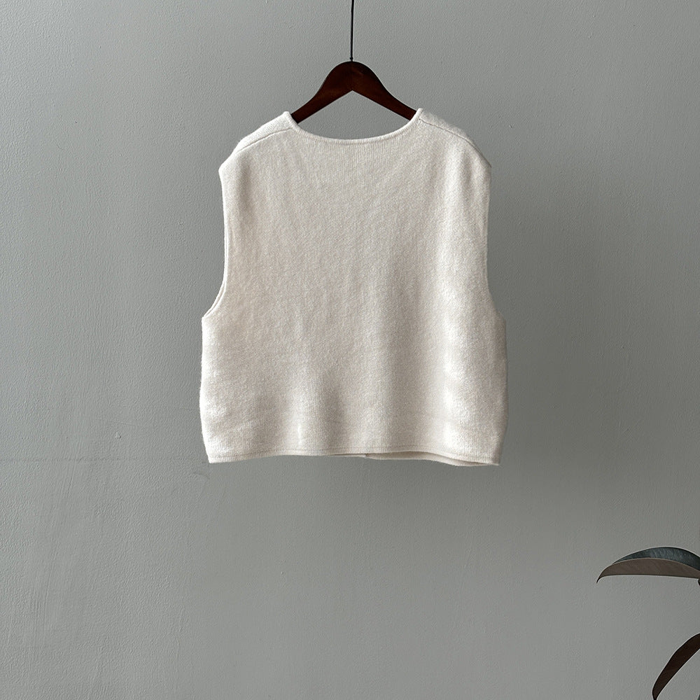 White knit vest on hanger from Gentle Knitted Vest collection, perfect for langry fashion and ملابس style