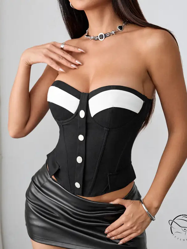 Black and white strapless neoprene corset with silver buttons and chest pad boning