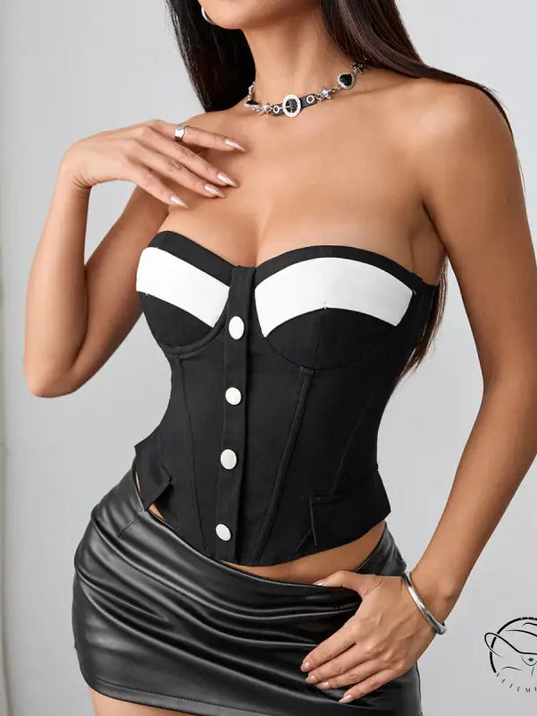 Black and white strapless neoprene corset with silver buttons and chest pad boning