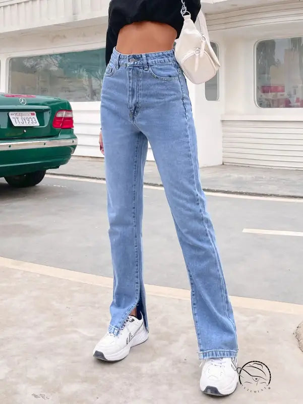 Light blue high-waisted Langry denim pants with split flared hems