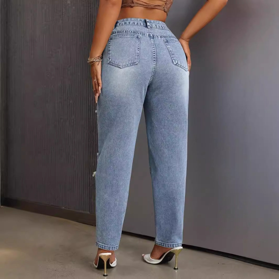 Slimming Skinny Ripped Jeans with light wash distressed denim and side pearl embellishments