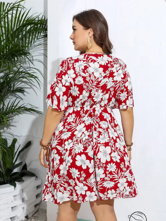 Casual V neck loose dress in red and white floral print with short sleeves and tiered skirt