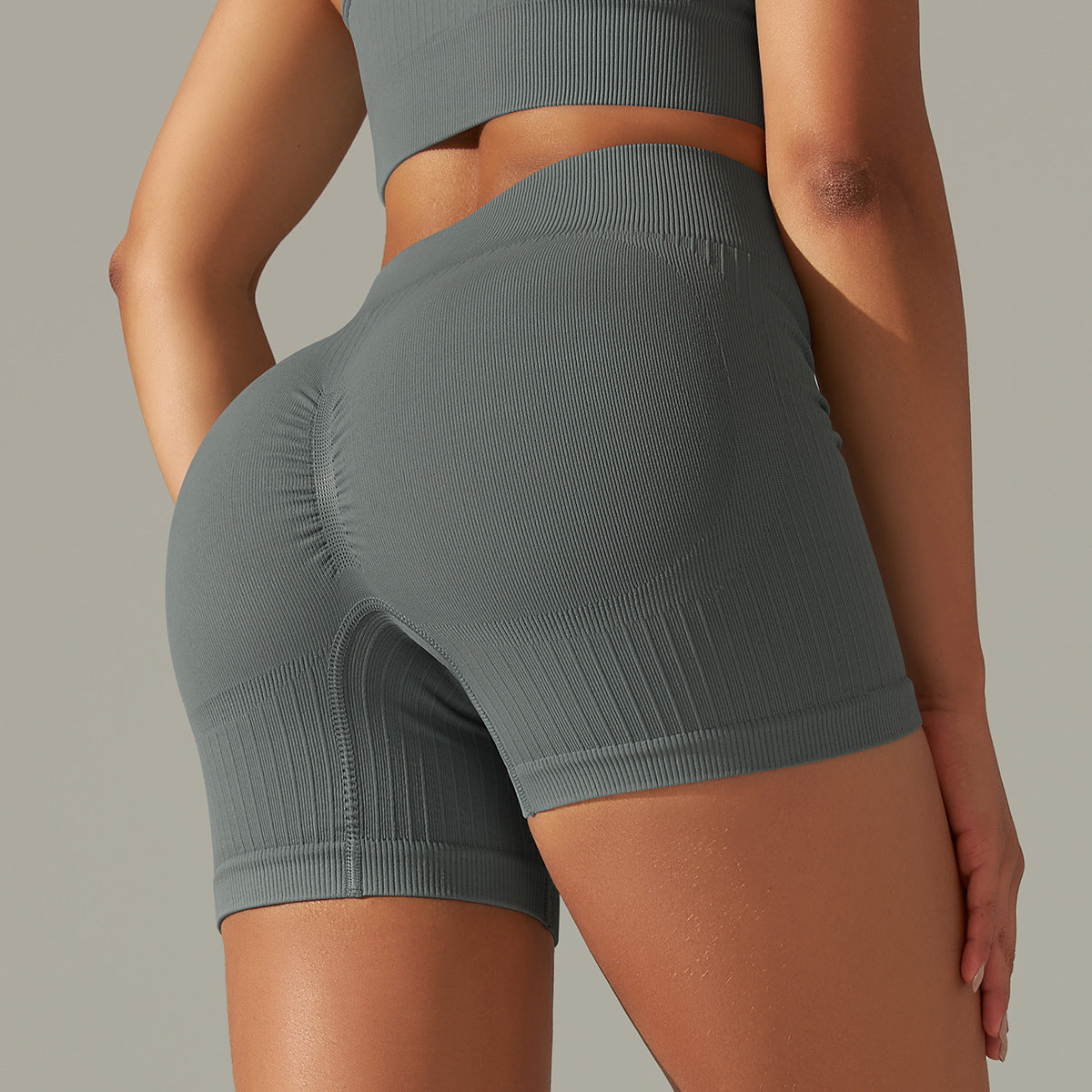 Gray ribbed workout shorts featuring seamless striped peach design for peach hip raise fitness