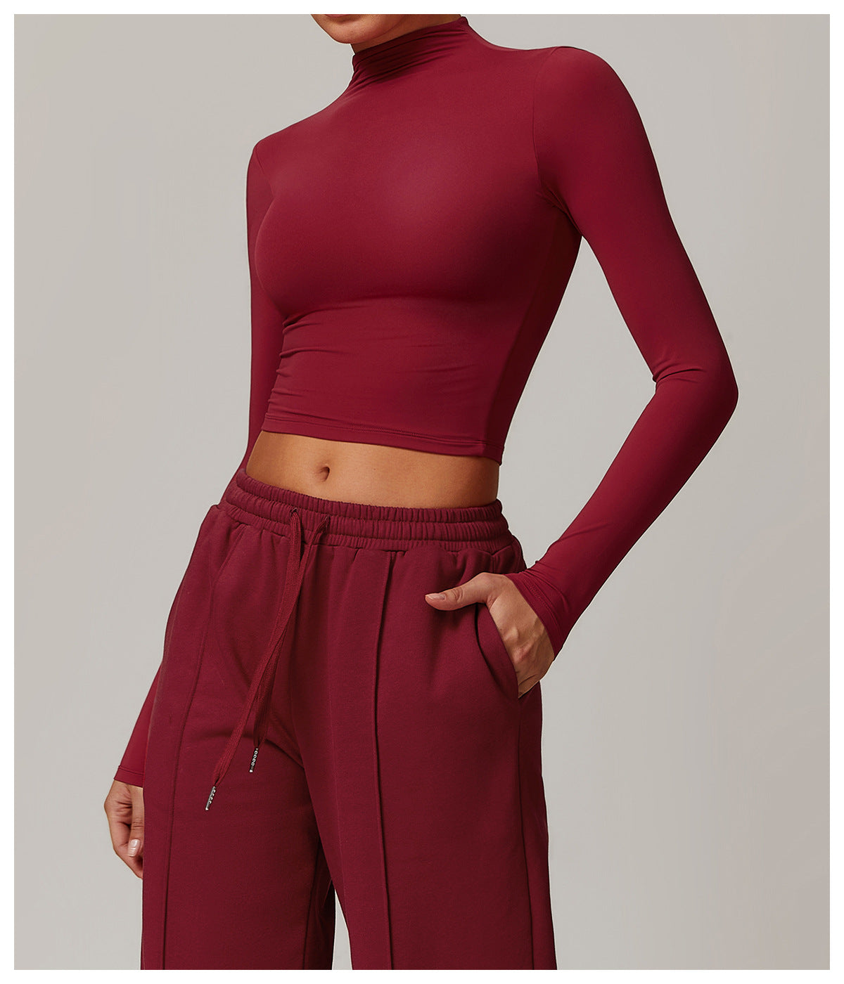 Burgundy long-sleeved crop top with mock neckline for quick drying fitness sports outerwear
