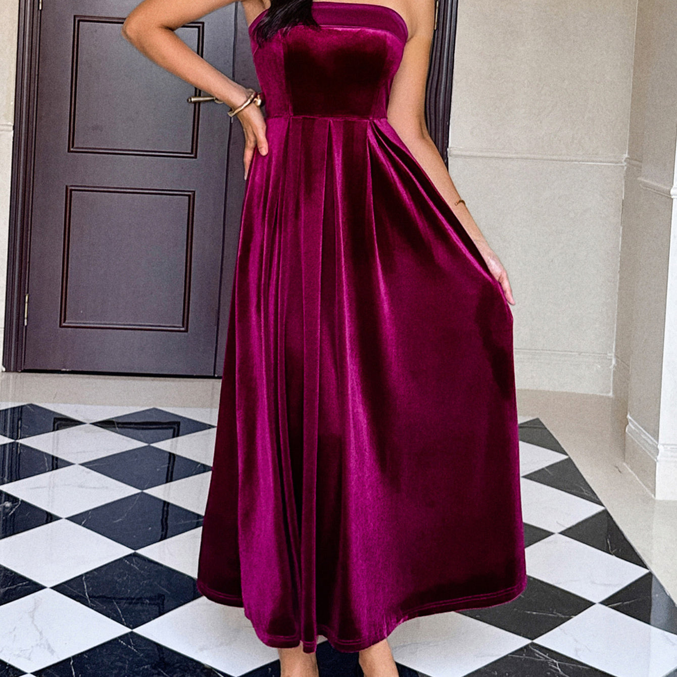 Elegant burgundy velvet strapless maxi dress with pleated skirt and high slit in Langry fashion