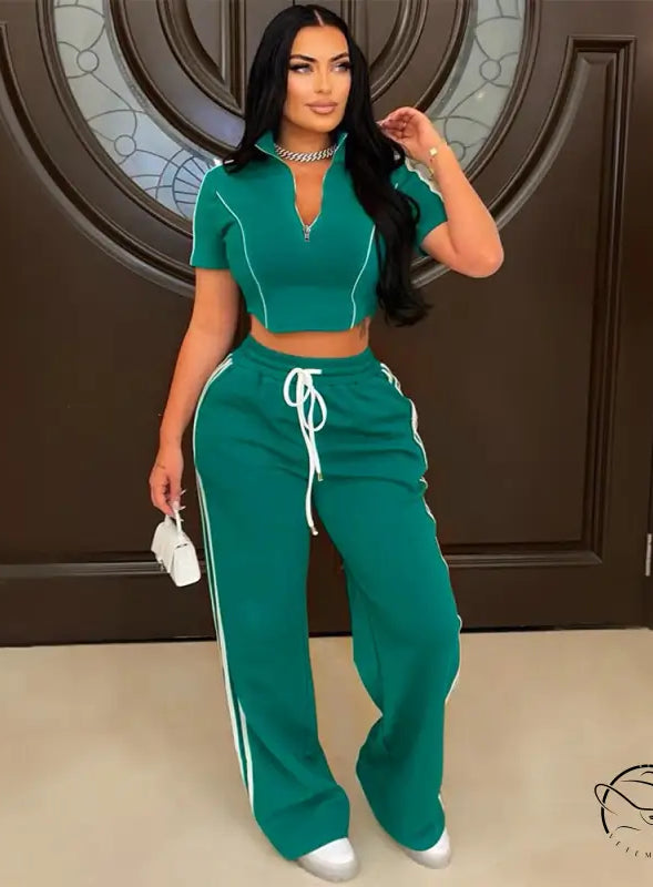 Green langry tracksuit with loose trousers, white stripes, drawstrings