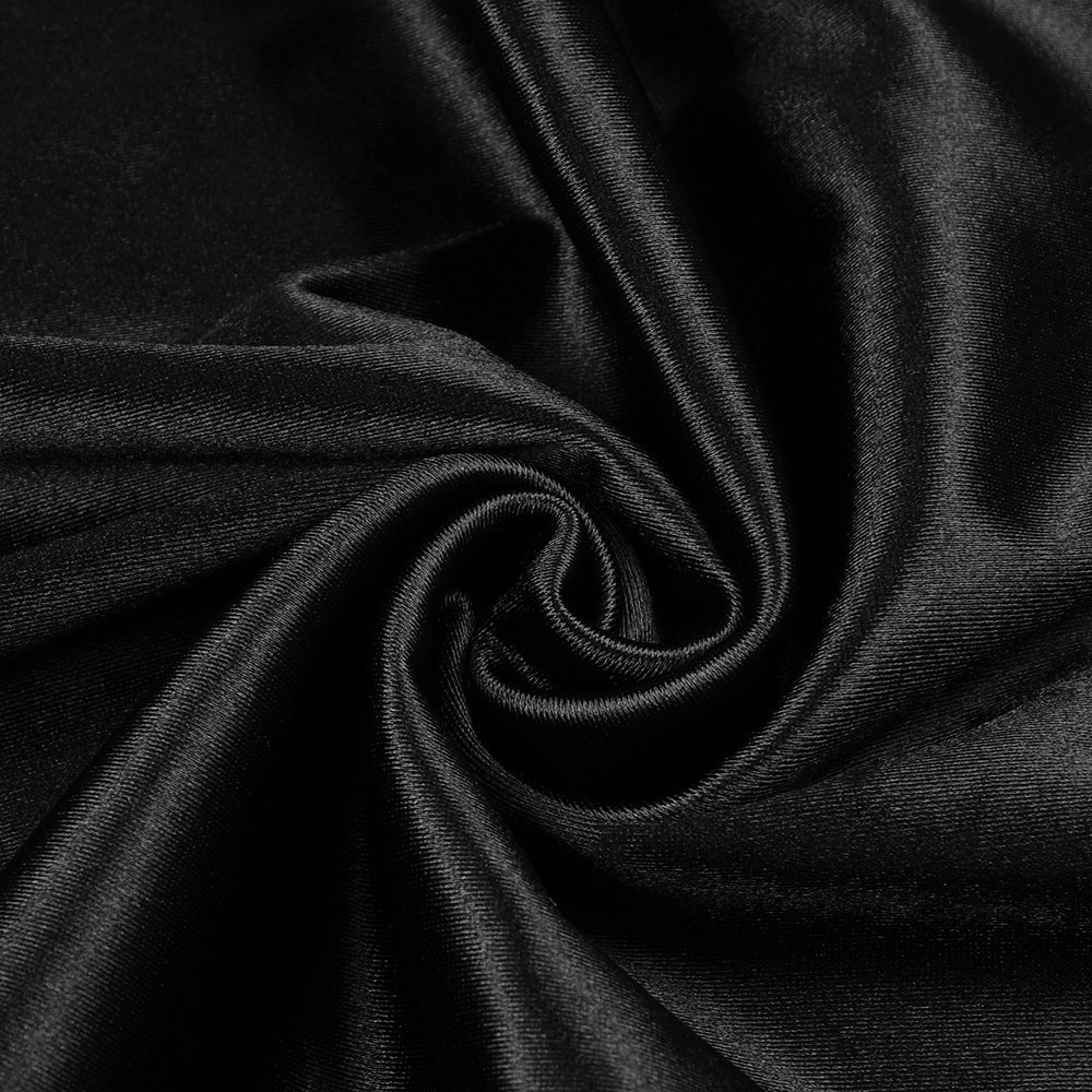 Swirling black satin fabric showcased in a women fashion halter silk dress with ملابس elegance