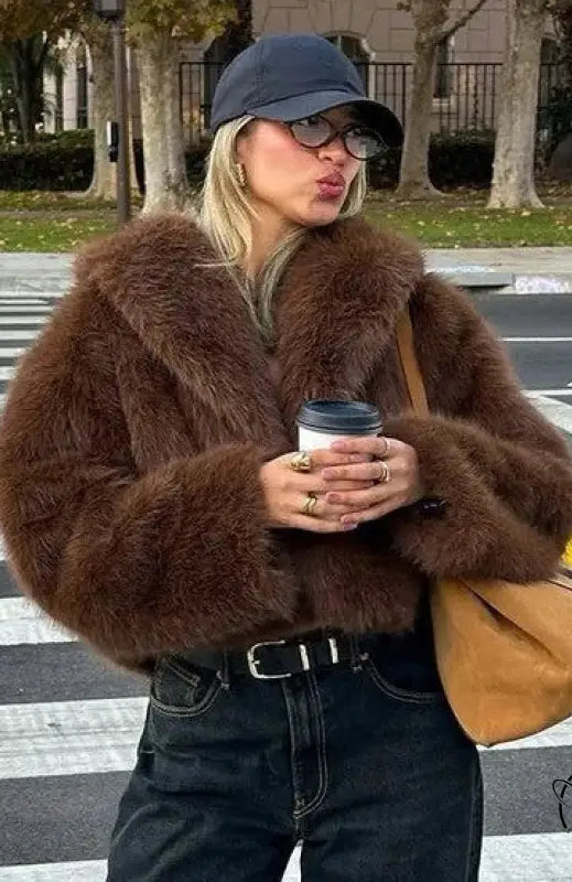 Gorgeous faux fur oversized jacket by Langry fashion with black buttons and belt