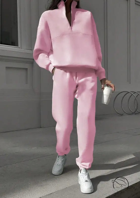 Pink Nike zip-up sweatshirt and pants set with white sneakers, langry fashion ملابس