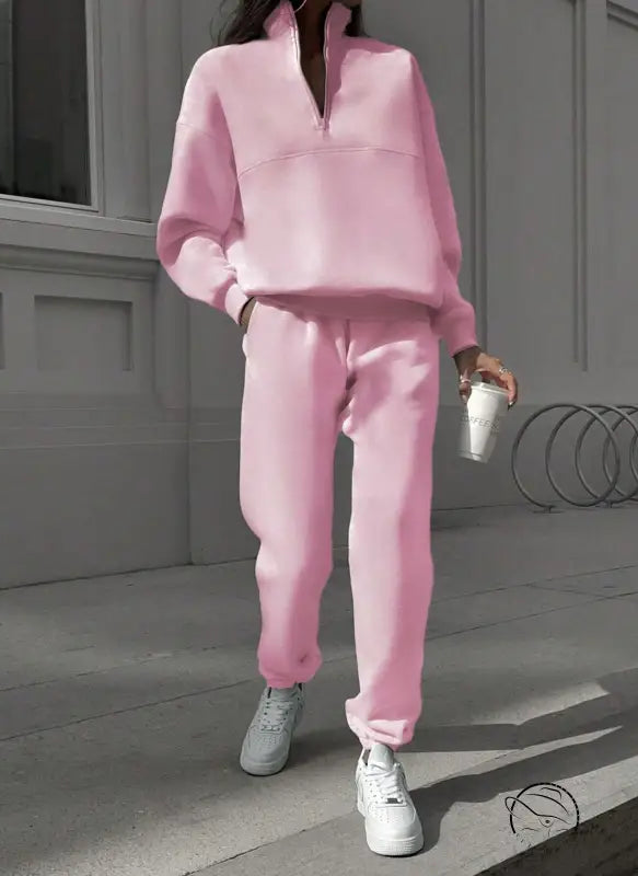 Pink Nike zip-up sweatshirt and pants set with white sneakers, langry fashion ملابس