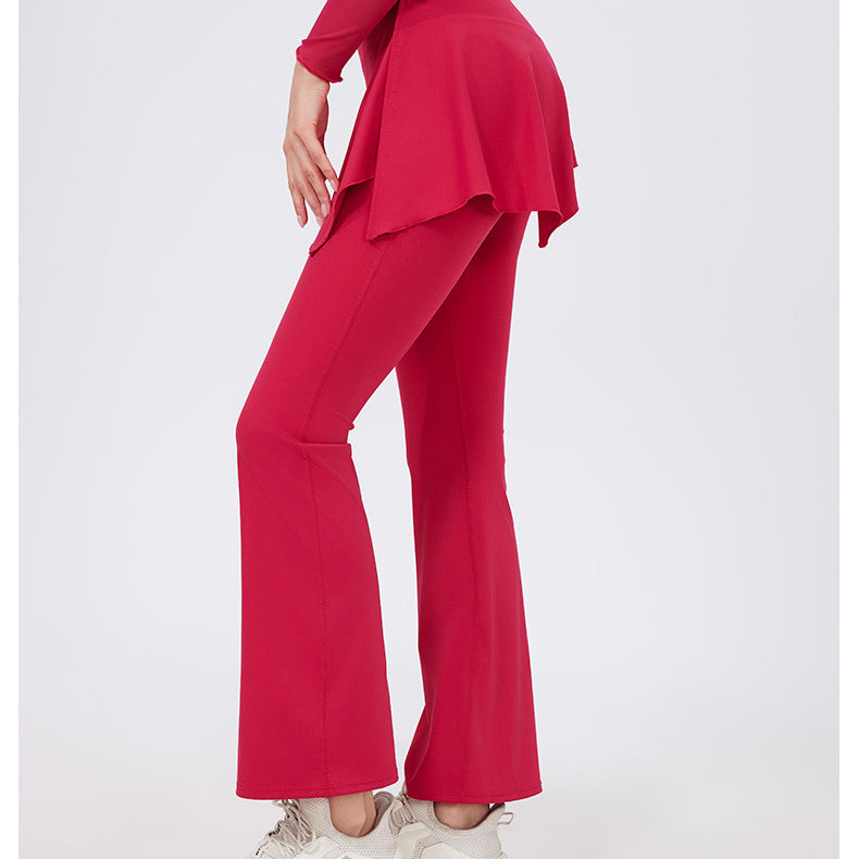 Red flared hip lifting yoga pants with nude feel ruffled hem and white sneakers