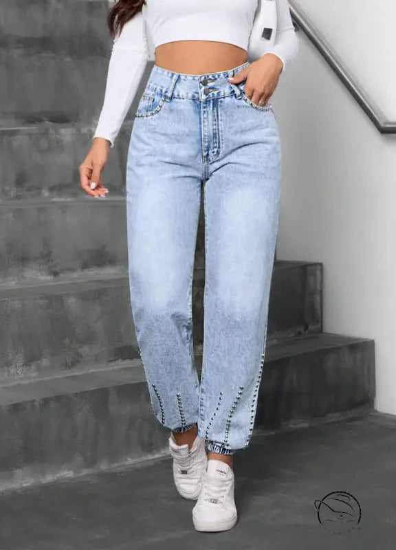 Light wash high-waisted beaded straight jeans with elastic cuffs