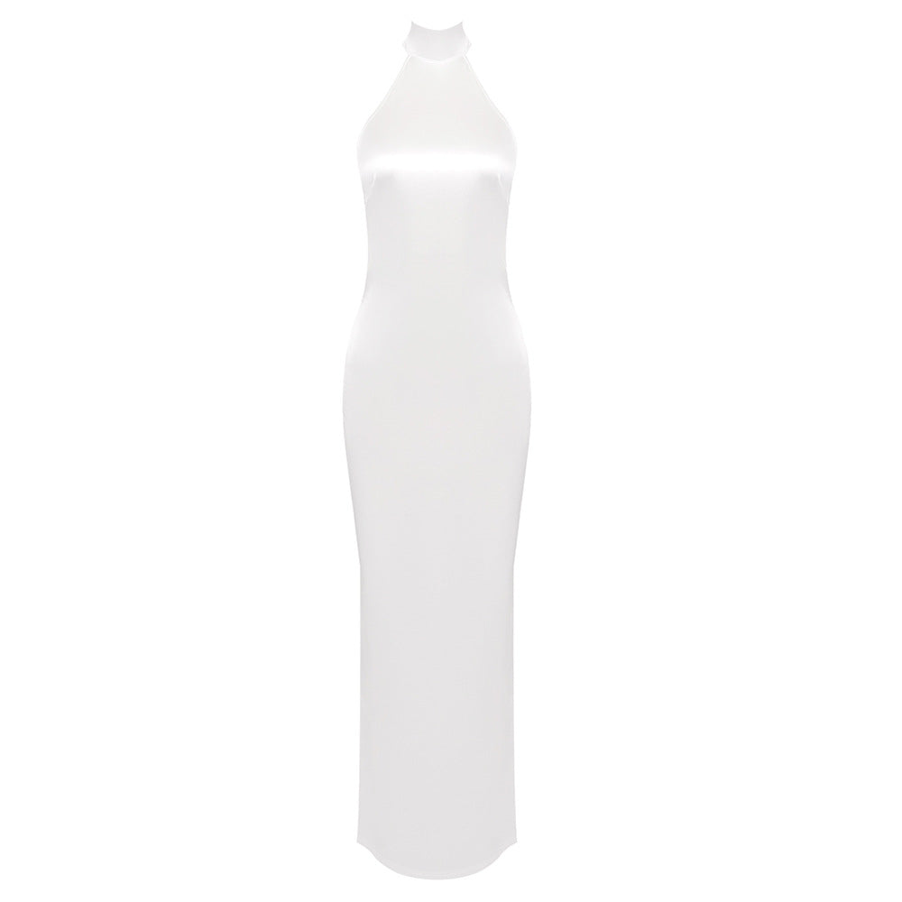 Elegant white halter neck maxi dress showcasing luxurious silk satin texture for modern fashion