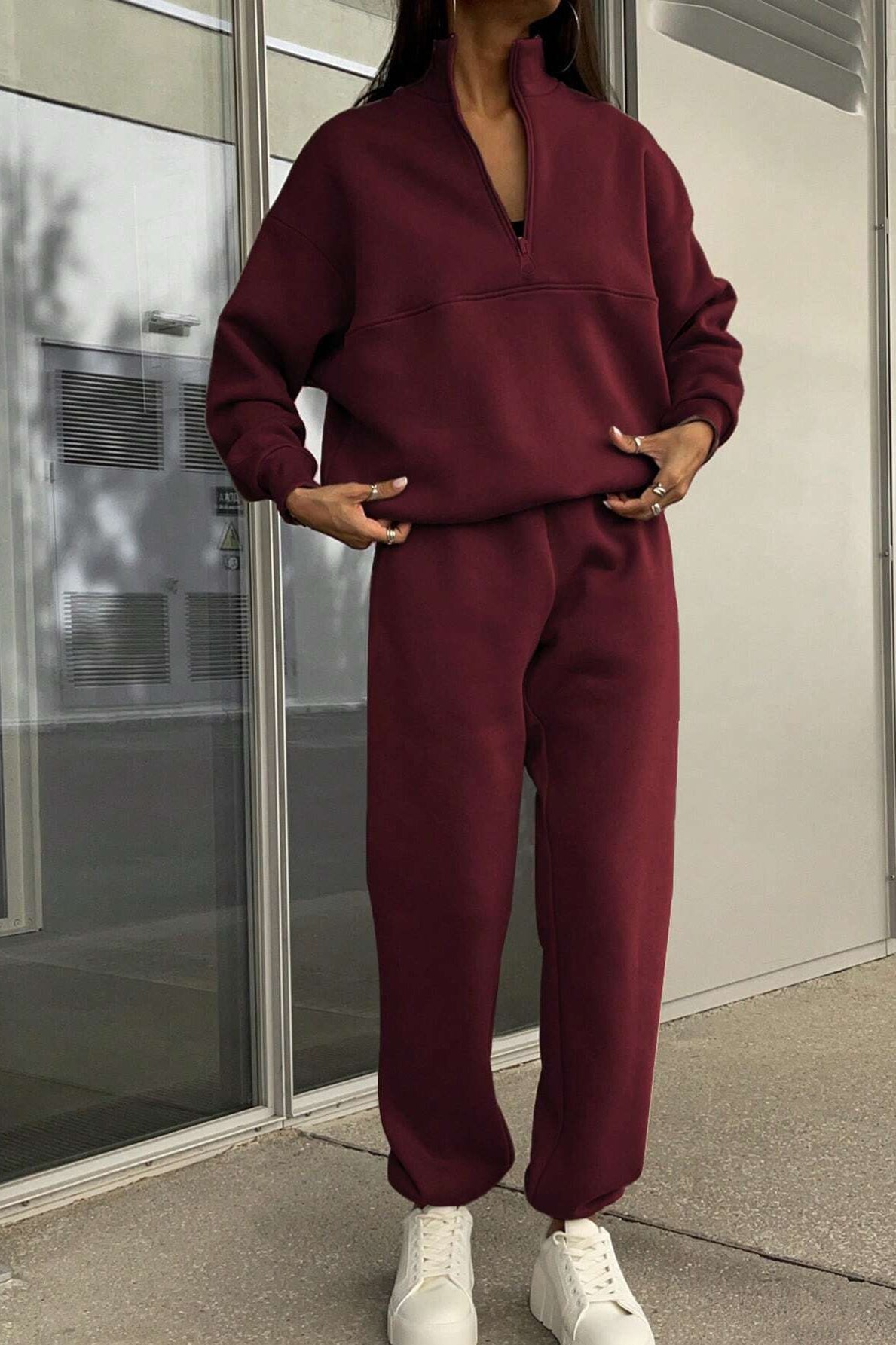 Maroon langry fashion tracksuit with white high-top sneakers, casual ملابس set
