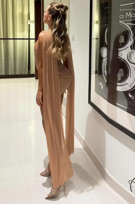 Elegant langry fashion peach dress with sheer back panel and silver heels