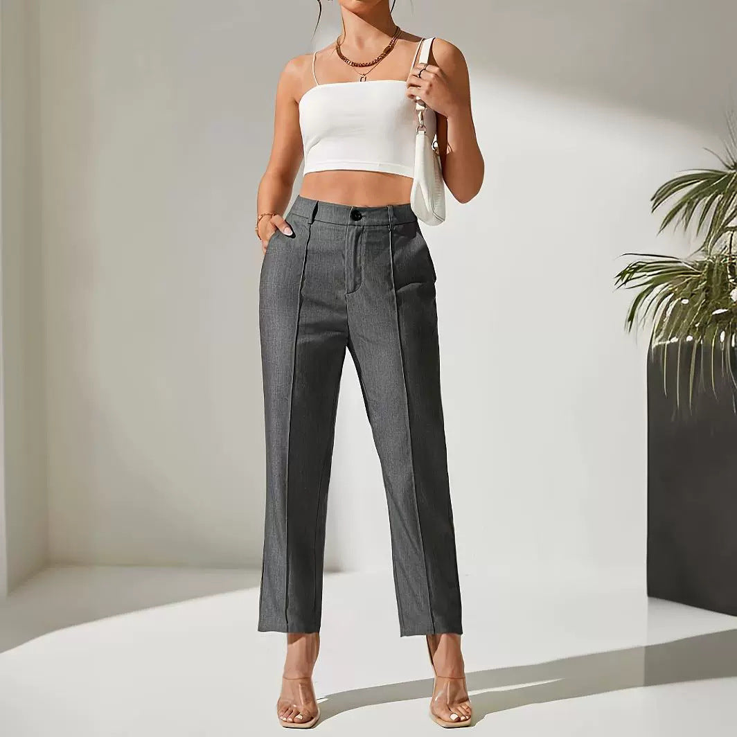 Gray high-waisted dress pants with pleats, perfect for women’s fashion and ملابس