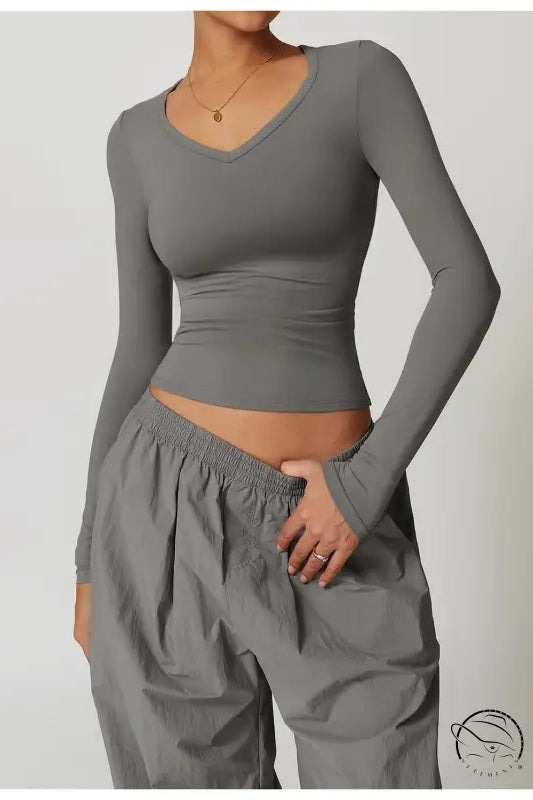 Gray long-sleeved V-neck quick drying brushed tight yoga top with baggy pants