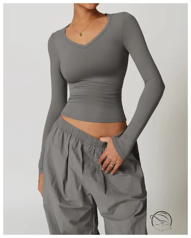 Gray long-sleeved V-neck quick drying brushed tight yoga top with baggy pants