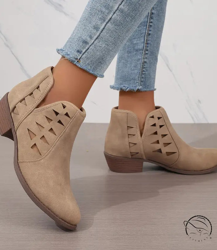 Beige suede daily ankle boots with geometric cutouts and low wooden heels