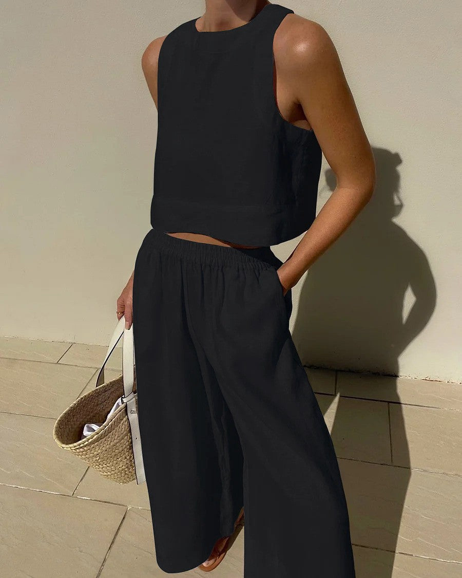 Black sleeveless crop top and wide-leg pants set for stylish casual fashion ملابس