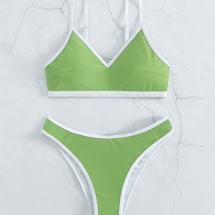 Green and white bikini showcasing solid color stitching with a small fresh and high waist design
