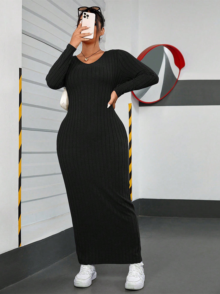 Black ribbed maxi dress from Winter Minimalist Slim Fit Sheath Dress collection showcasing elegant fashion and ملابس style