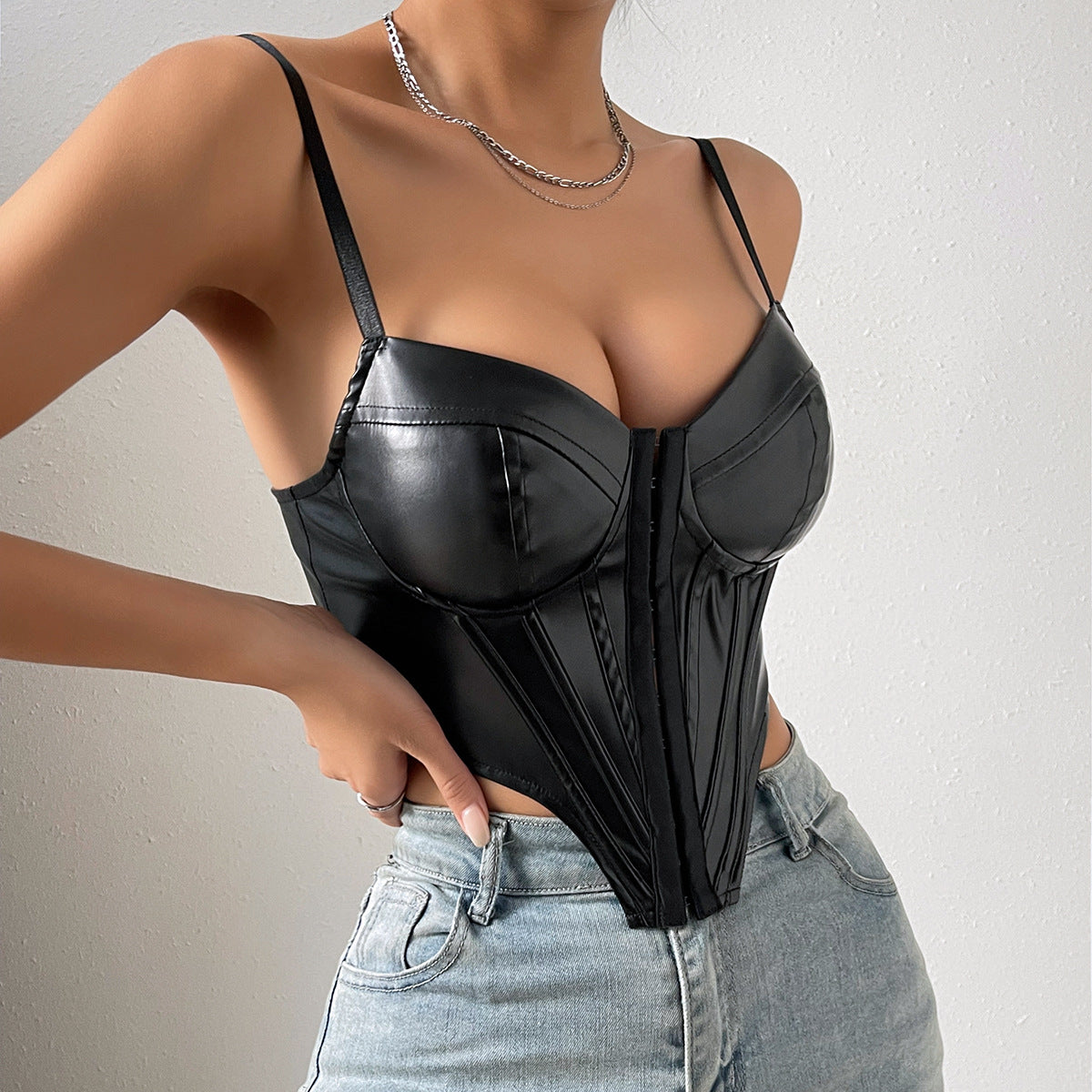 Black faux leather corset top in a solid color, stylish and elegant for women