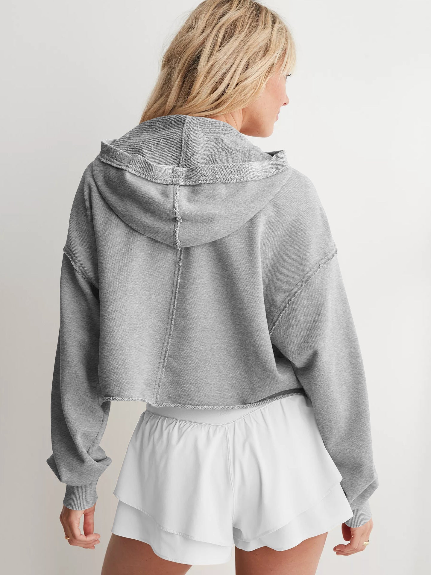 Cropped grey hoodie sweatshirt with white shorts, perfect for trendy langry fashion