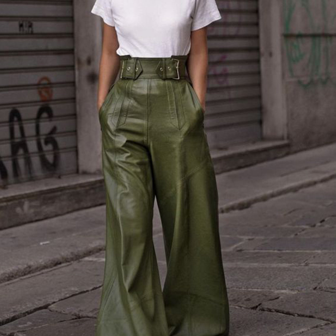High-waisted, wide-leg faux leather bell bottom pants in olive green for modern fashion